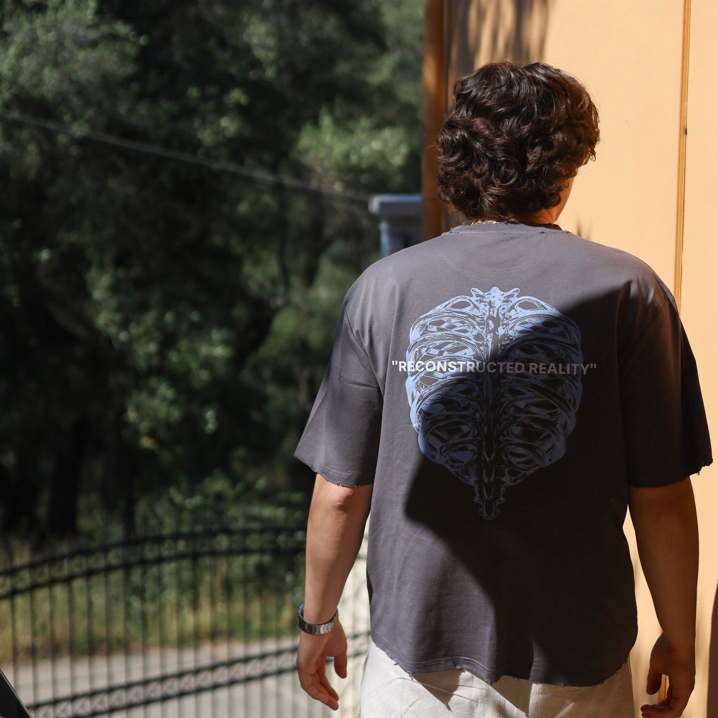 DISTRESSED RECONSTRUCTED REALITY TEE