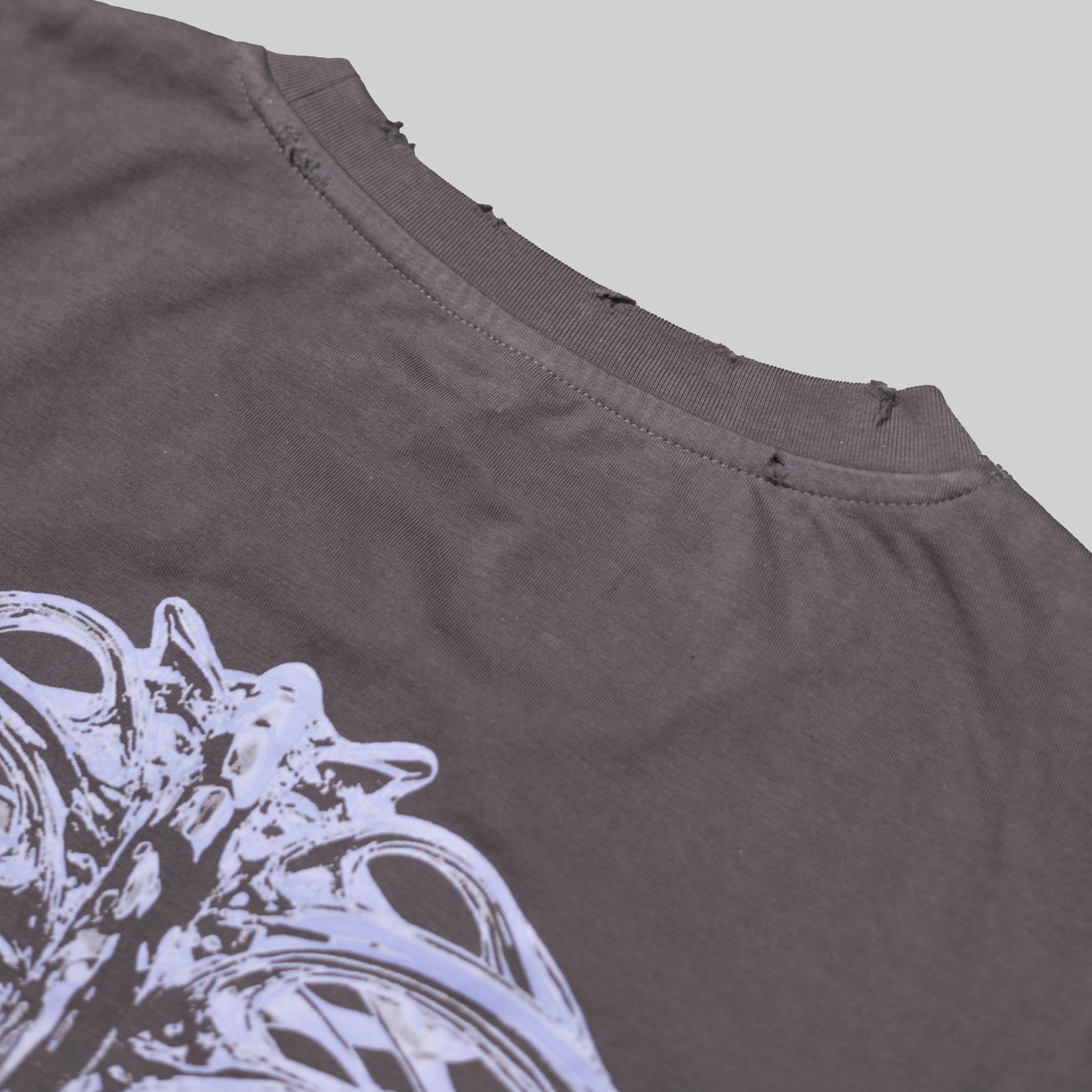 DISTRESSED RECONSTRUCTED REALITY TEE